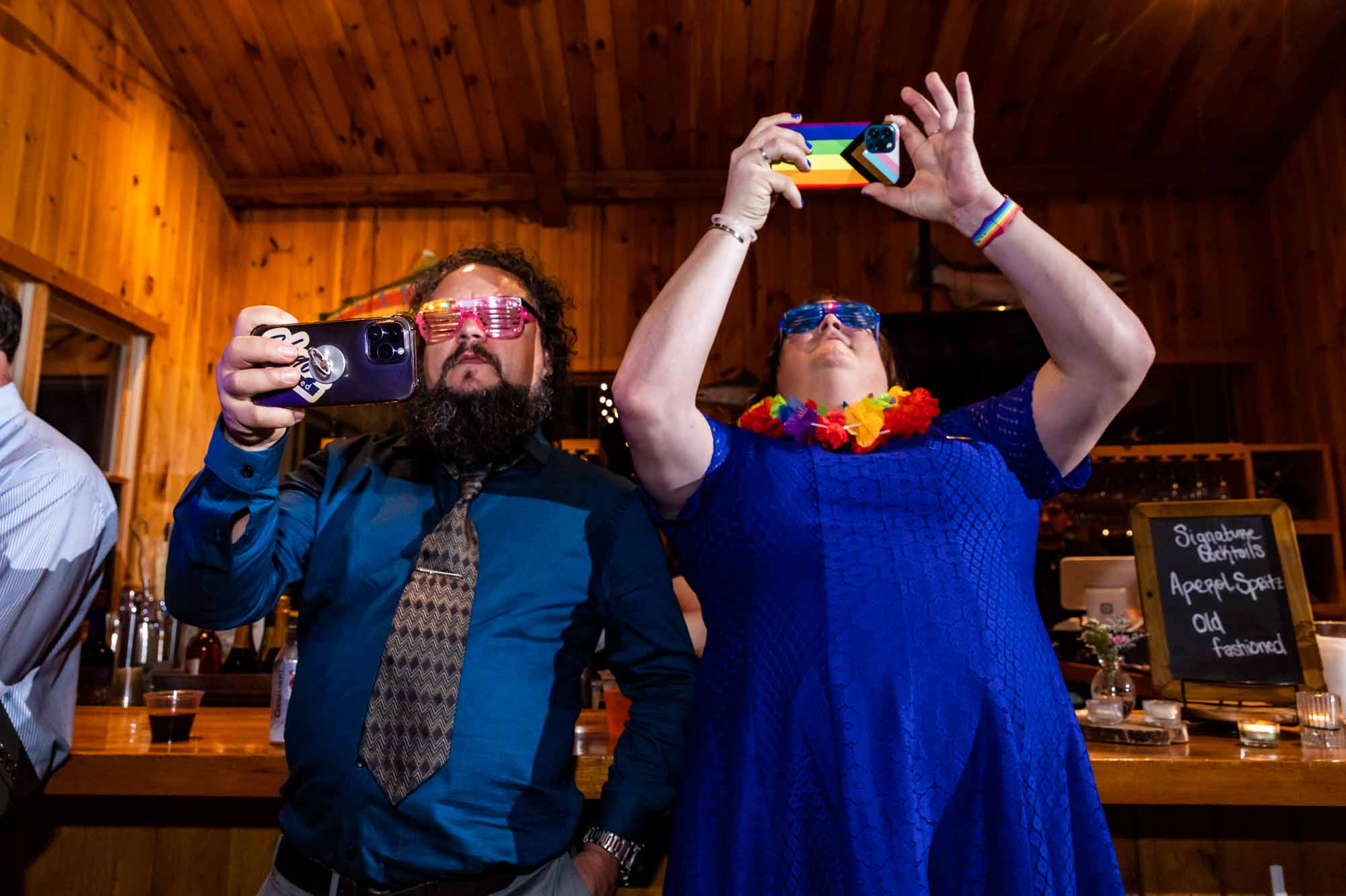 Candid moment of guests laughing during reception at Adventures on the Gorge wedding
